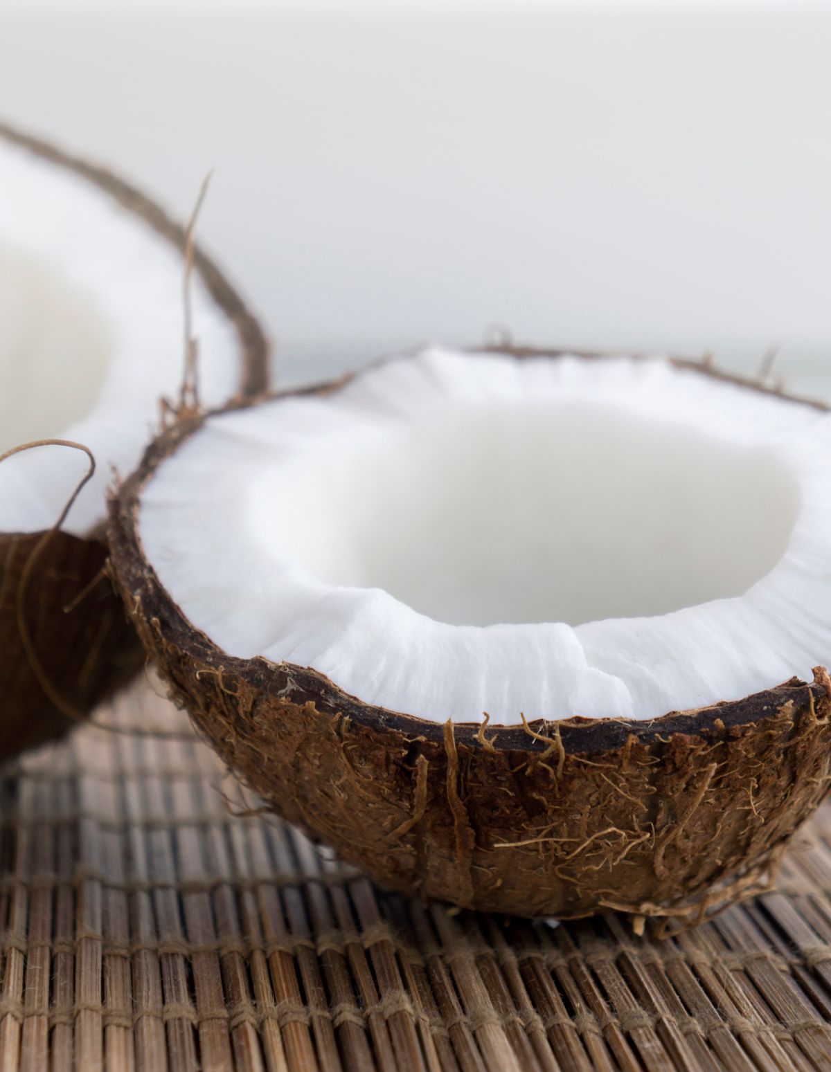 Halved coconut showing fresh white flesh