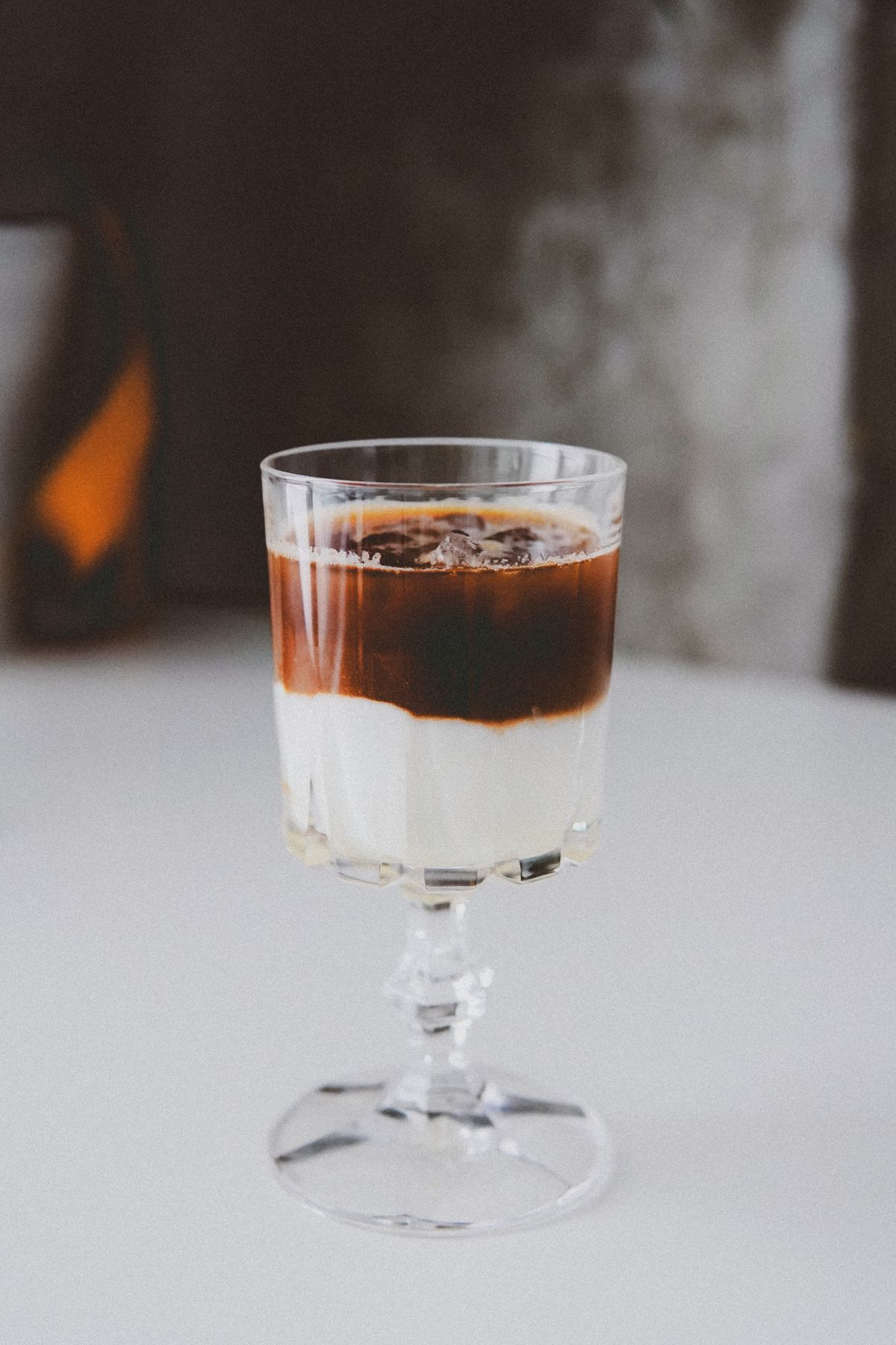 Layered iced latte in a clear glass